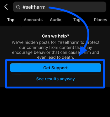 The Instagram support pop-up button for a hashtag that might encourage harm to users
